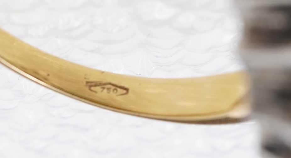 A sapphire and diamond cluster ring